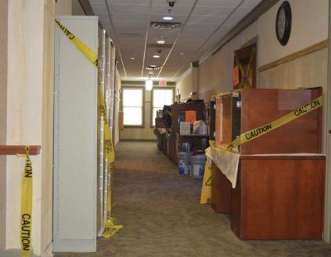 Furniture and supplies from the Lampasas County Auditor’s Office rest in the hallway as renovations and repairs continue. erick mitchell | dispatch record