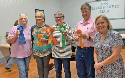 Lometa L-M Garden Club held its annual Flower Show last week. Show winners, from left, are Teresa Stewart, who took Best in Show for Design; Tico Hicks, who received two Awards of Merit; Lewvon Hicks, who also captured two Awards of Merit and was named Best in Show; Sue Anderson, with one Award of Merit; and Sheri Stone, who served as judge this year. val cash | courtesy photo