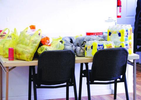 Sacks of food and water donated to Lampasas Community Church were on hand when the facility opened Thursday to those in need of a nourishing meal and a warm place to spend the night. JOYCESARAH MCCABE | DISPATCH RECORD