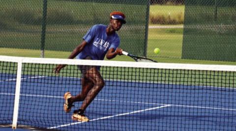 Cinai Brady-Testamark levies a volley for the Badgers in Friday’s tennis match at Leander. C OURTESY PHOTO |