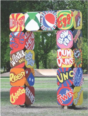 The Pop Art Portal, designed and created by Mike Kuehne’s sixth-grade art classes, stands tall in the Hanna Springs Sculpture Garden. See related photo on page 10. ALEXANDRIA RANDOLPH | DISPATCH RECORD
