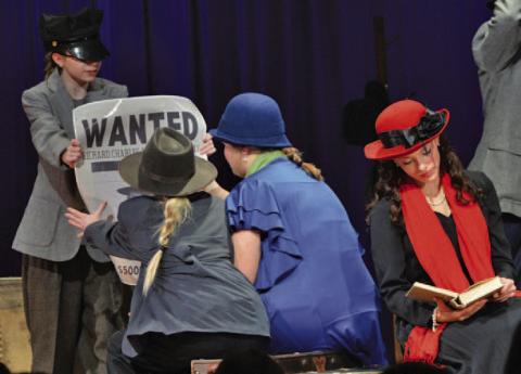 Lampasas Middle School students perform a scene from “The 39 Steps Even More Abridged” during their UIL One-Act Play rehearsal last Friday evening. ERICK MITCHELL | DISPATCH RECORD