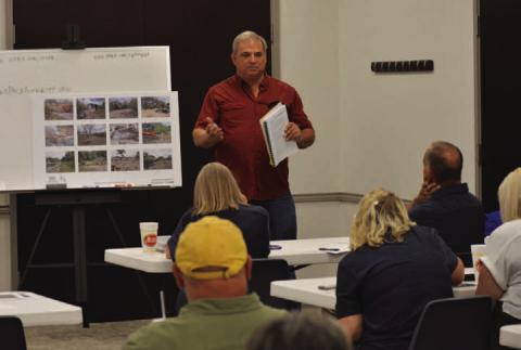 Robert Lansford, the city’s new aviation director, speaks to the Forward Lampasas group last week and describes what is needed at the Lampasas Municipal Airport in terms of expansion and improvements.