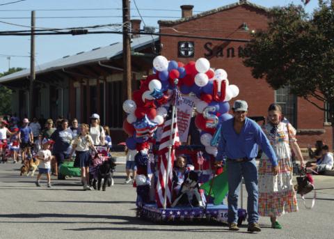 ERICK MITCHELL | DISPATCH RECORD Participants kicked off last week’s Pet Parade outside the Santa Fe Depot building with their best-dressed companions.