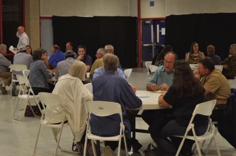 Participants in Wednesday’s community stakeholders meeting break up into small groups to facilitate discussion on ways to improve the city and plan for future growth. ERICK MITCHELL | DISPATCH RECORD