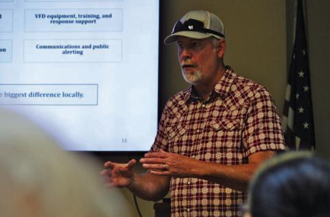 Casey Childers of Natural Resources Solutions discusses the steps the consulting firm will take to develop a wildfire plan for the county that will enable it to apply for grants. ERICK MITCHELL | DISPATCH RECORD