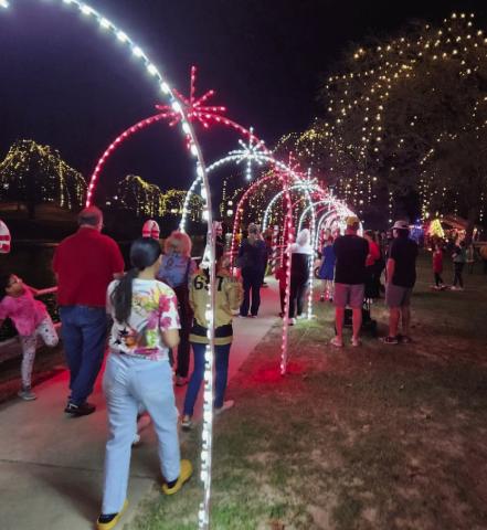 Throngs of Lampasans strolled through Candy Cane Lane at W.M. Brook Park on Saturday to view the holiday lights and festive decorations set up to celebrate the Christmas season. The Christmas on the Creek event offered rides on the Candy Cane Express, a visit with Santa and Mrs. Claus, and a stroll through the North Pole Village while sipping on hot chocolate. The special lights display will be available in the park through the New Year’s holiday. DAVID LOWE | DISPATCH RECORD
