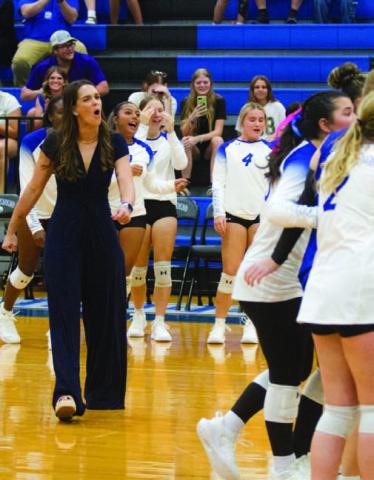 ERICK MITCHELL | DISPATCH RECORD Head coach Ali Tippie celebrates a Lady Badger victory earlier in the season.