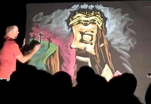 Cory Devivo has been with Masterpiece Ministries for 19 years. He uses his chalk art to tell the gospel story. Courtesy photo