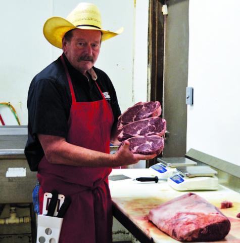 Stephen Meyer of M&amp;M Butcher Block displays some of the prime cuts of beef he plans to serve when his M&amp;M Steakhouse concept opens neext year on the courthouse square. Meyer is in the process of purchasing the former Eve’s Cafe building. After renovation, the steakhouse will open for dinner and feature high-quality steaks, traditional sides, and local wines and craft beers. ERICK MITCHELL | DISPATCH RECORD