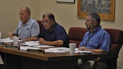 Trustees Randy Morris, at left, Harvey Stinnett in center and Jeff Rutland listen to a presentation at last week’s Lampasas ISD Board of Trustees meeting. The school board will convene in a called meeting tonight at 5 p.m. to consider additional construction options for Lampasas Middle School. ERICK MITCHELL | DISPATCH RECORD