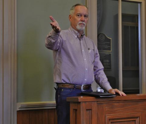Corix Utilities-Texas President Darrin Barker makes remarks at Monday’s Lampasas County Commissioners Court meeting. He noted upgrades the water system is undergoing and addressed the effect potential new subdivision projects, such as the Pitt Creek Ranch development, might have on Corix customers. ERICK MITCHELL | DISPATCH RECORD