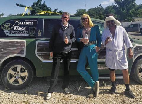 From left to right are Brant Martin, Zac Morris and RJ Miller as they pose in front of their National Lampoon-themed van prior to leaving Lampasas for the annual 2 The Crack and Back scavenger hunt adventure. COURTESY PHOTO