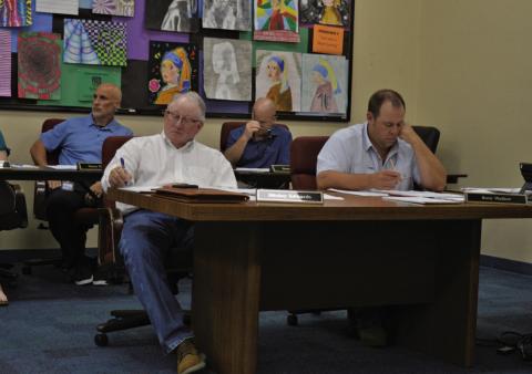 ERICK MITCHELL | DISPATCH RECORD LISD board members Mickey Edwards and Sam Walker look on during Wednesday’s called meeting.