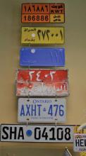 License plates from across the globe are displayed in the Lampasas County Tax Assessor-Collector’s office in the county annex building at 409 S. Pecan St. erick mitchell | Lampasas Dispatch Record