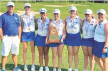 COURTESY PHOTO | LAMPASAS ATHLETICS The Lady Badger golf team poses with the regional championship trophy after winning by 23 strokes last week.