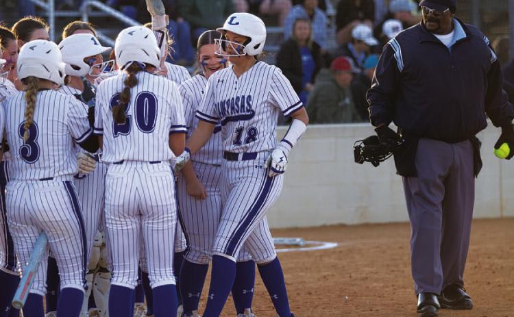 HUNTER KING | DISPATCH RECORD Madison Magilke steps on home plate after her three-run homer against Cedar Park on Monday.