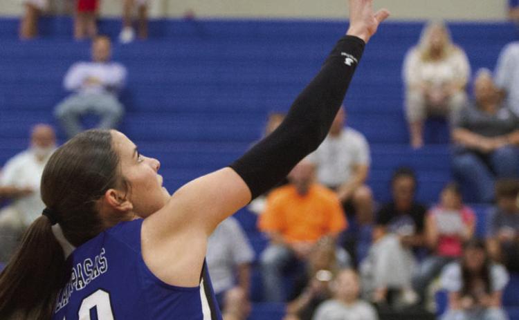 Ysabella Swain makes a play at the net in the Lady Badgers’ three-set victory over the Waco Lady Lions on Tuesday. ERICK MITCHELL | DISPATCH RECORD