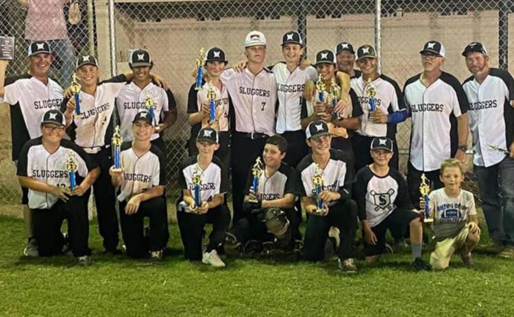 The 14U Sluggers, coached by Chris Harrison, qualified for the Texas Teen-age Association state tournament in Hillsboro, which will be July 12. COURTESY PHOTO