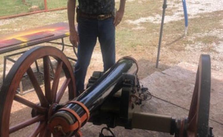 SCV member Ross J. Cox Sr. examines a half-scale cannon near Brownwood. The Saltworks Camp No. 2353 plans to acquire a full-scale model later this year. MICHAEL OLIVER | COURTESY PHOTO