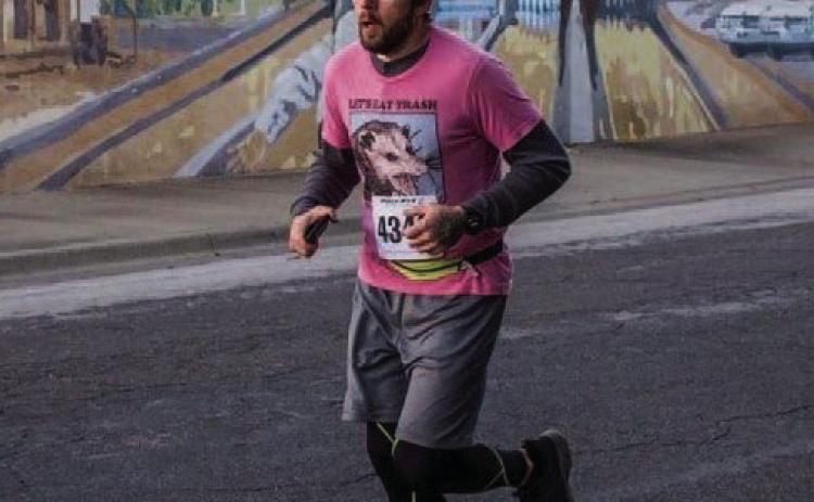 Steve Barlet runs the Lampasas Run Club Veterans Day 5K. He has organized a charity event on Dec. 24 to benefit families displaced by a recent fire. COURTESY PHOTO