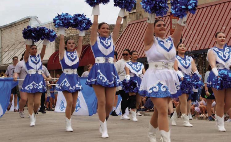 The Spring Ho Grand Parade will come through the downtown Lampasas area mid-morning on July 11. Parade dignitaries will include Craig and Donna Benton, this year’s honorary marshals. Floats, cavalry units, marching bands and of course the Flames drill team will take part. FILE PHOTO