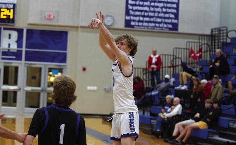 HUNTER KING | DISPATCH RECORD Peyton Sisson shoots over a Whitney defender. He scored 24 points in last Friday’s contest.