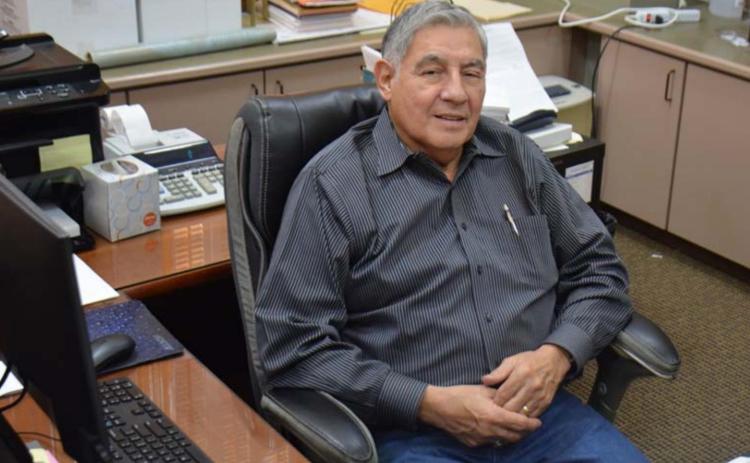 Longtime Justice of the Peace Andrew Garcia Jr. took some time for photos Monday before clearing his office. Garcia, who served in the Precinct 1 seat for 14 years, retired Sept. 30. MONIQUE BRAND | DISPATCH RECORD