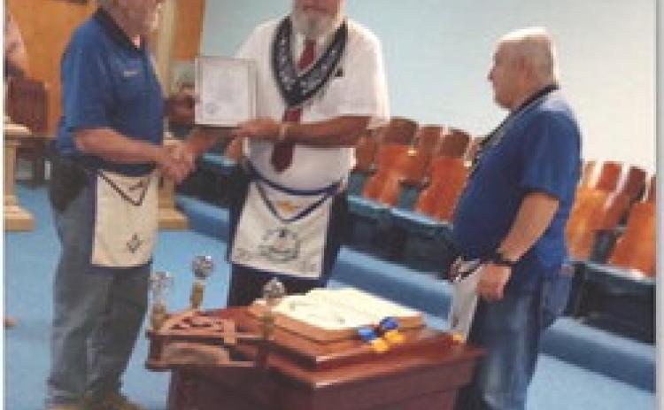 John Easler of Copperas Cove receives a service award from Saratoga Masonic Lodge #546 at a recent meeting. courtesy photo