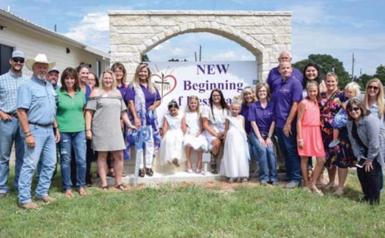 Lampasas County Chamber of Commerce directors joined with Snow Queen representatives to welcome New Beginning of Restoration and Hope to its location on U.S. Highway 183 South when officials opened the pregnancy resource center there in 2019. FILE PHOTO