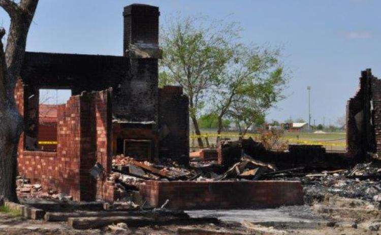 A fire Sunday morning destroyed this house two blocks from the Lometa Independent School District campus. COURTESY PHOTO