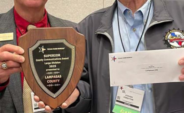 Texas Farm Bureau District 8 State Director Michael Moon of Bell County, at left, presents an award plaque and $250 check to Lampasas County Farm Bureau, represented here by director and publicity coordinator Dr. Steve Forsythe. Lampasas County was recognized as a superior Farm Bureau for its communications/ social media efforts in agricultural advocacy.