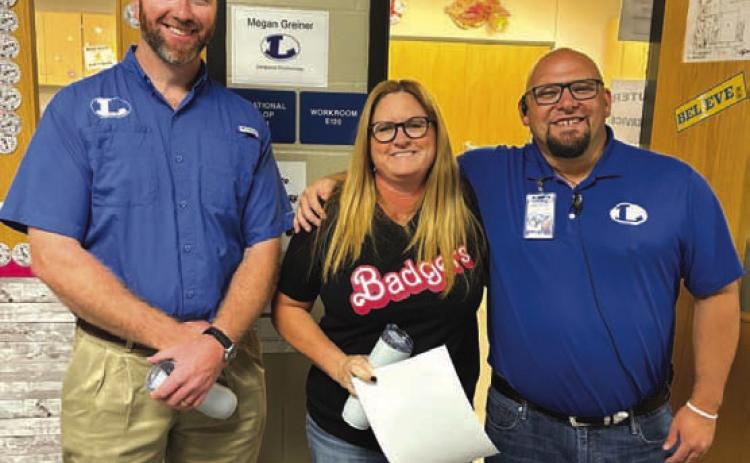 Recognized as Star Supporter of the Month was Beth Oestreich, an instructional technologist at Lampasas High School. “She has had many challenges throughout this year, and she has handled them all with grace,” Assistant Principal Ryan Race said. Oestreich is pictured with Texas Farm Bureau Insurance representative Clay Phillips, at left, and Race. COURTESY PHOTO