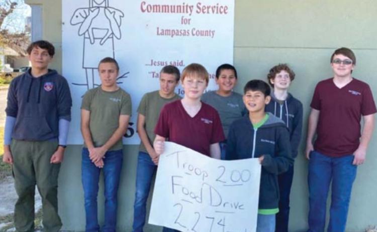 Boy Scout Troop 200 is shown last year after it dropped off 2,274 pounds of donated nonperishable food items at Lampasas Mission. Pictured, left to right, are Luke Coonrod, Jimmy McAnally, Daniel McAnally, Grayson Eddinger, Pablo Cortez, Jayton Saucedo, Jace Silsby and Tommy Bushong. courtesy photo