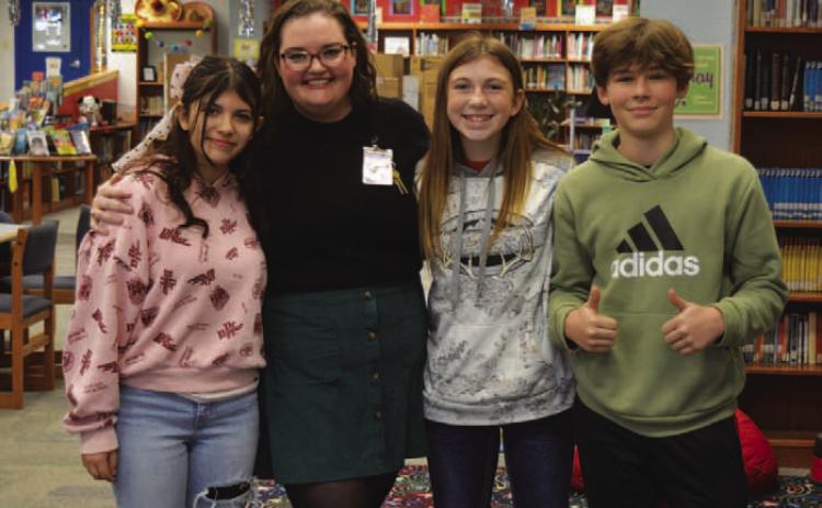 The Lampasas Middle School theatre director Kelli Cox stands between LMS students, left to right, Zoey Rivas, Holley Wakeman, and Grady Groves. ERICK MITCHELL | DISPATCH RECORD