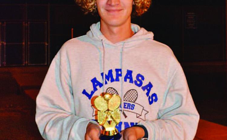 Luke Rogers holds his trophy after winning first place at the Georgetown tournament last week. COURTESY PHOTO | KENNETH PEISER