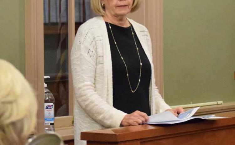 Central Counties Services Executive Director Johnnie Wardell speaks to the Lampasas County Commissioners Court on Monday about the services the non-profit mental health organization offers. Alexandria Randolph | Dispatch record