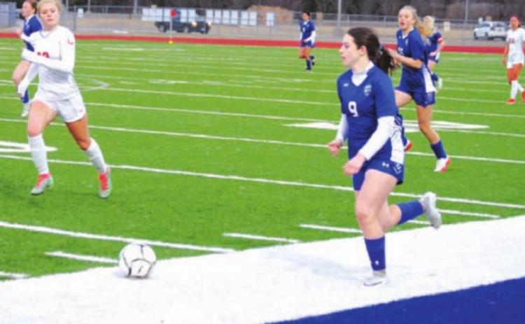 Bella Lindsey dribbles down the left wing against the Lake Belton Lady Broncos. HUNTER KING | DISPATCH RECORD