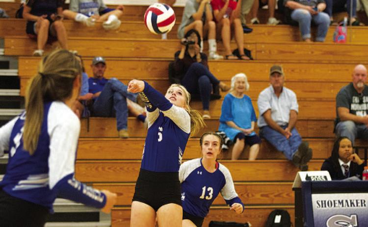 Scout Barton plays a pass during the first set of Tuesday’s game against Shoemaker. HUNTER KING | DISPATCH RECORD