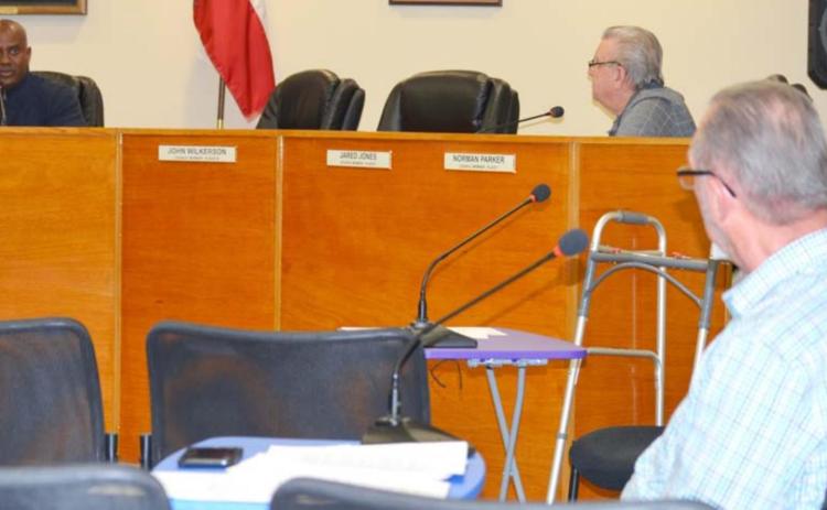 During a meeting Tuesday, Kempner Mayor Dr. Keith Harvey, left, Councilman Norm Parker, second from right, and Mayor Pro Tem Mack Ruszkiewicz discuss plans for hiring a city manager. DAVID LOWE | DISPATCH RECORD