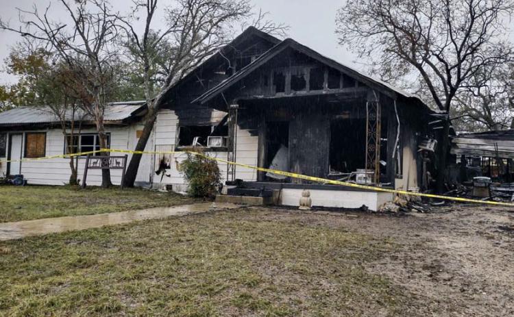 Fire caused extensive damage Sunday to this West First Street house and adjacent apartment. The occupants and their pets were able to evacuate safely, but the structures have been deemed a total loss. DAVID LOWE | DISPATCH RECORD