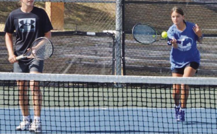 COURTESY PHOTO | KENNETH PEISER Jack Allison, left, and Madelynn White won their first mixed doubles match last week.