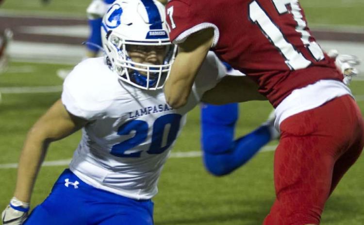 Levi Rivera wraps up a Fredericksburg receiver during the Badgers’ 52-42 win last week. HUNTER KING | DISPATCH RECORD