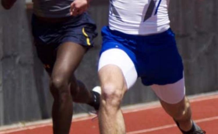 Cade White, right, sprints to first place in the 100-meter dash on Thursday in Brownwood. JEFF LOWE | DISPATCH RECORD