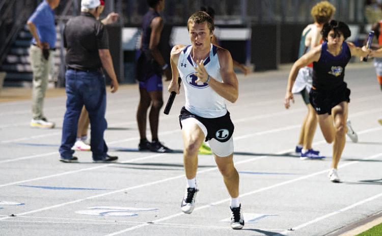 HUNTER KING | DISPATCH RECORD Sean Smith has been running the third leg in the 4x400-meter relay for the Badgers.