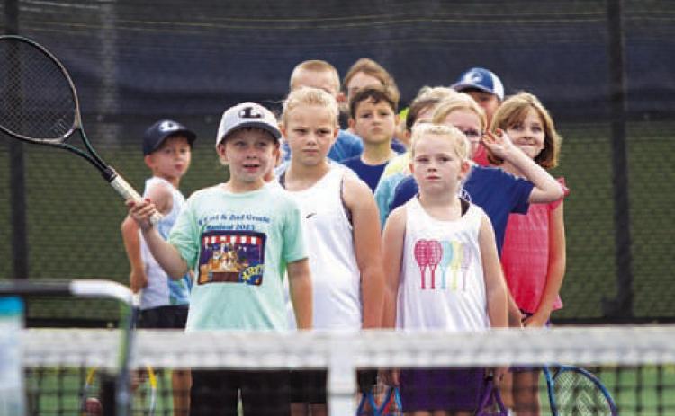 HUNTER KING | DISPATCH RECORD Campers wait in line for the next drill to start.