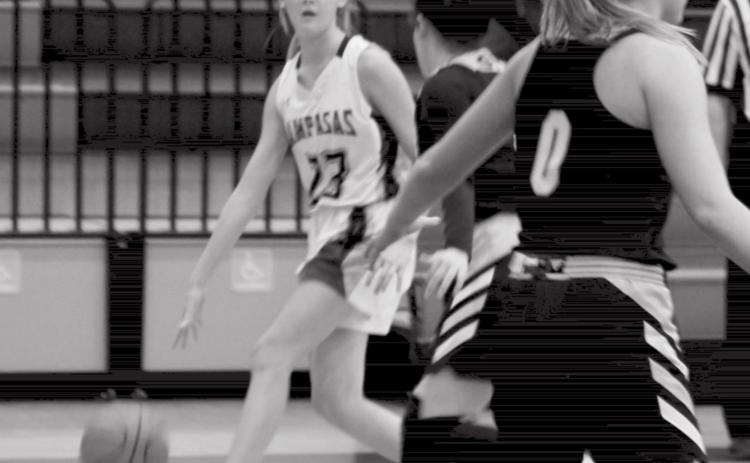 Payton Tatum dribbles the ball while being covered by a Gatesville Hornet. CHRIS YBARRA | DISPATCH RECORD