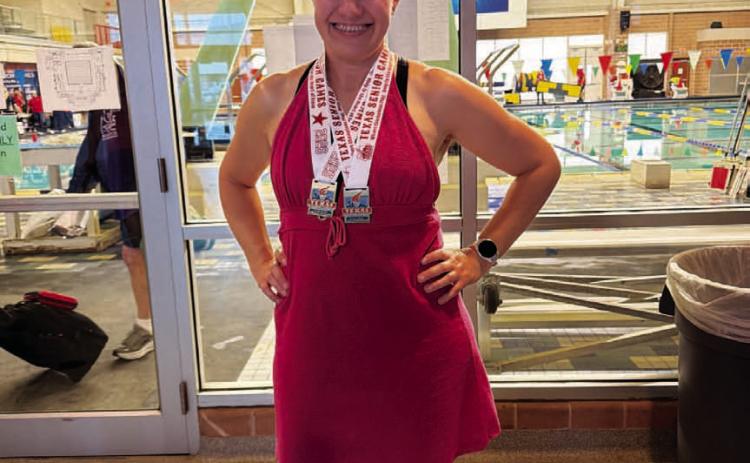 Keitha Goodwin poses with her medals from two first-place finishes at the Texas Senior Games. COURTESY PHOTO