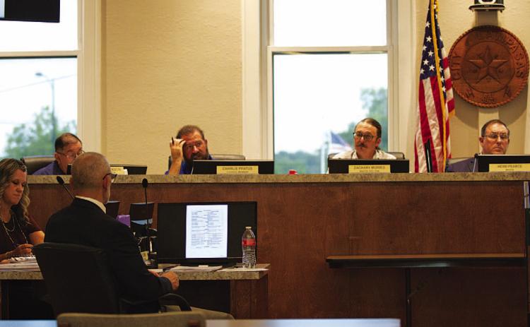 City Manager Finley deGraffenreid looks on as members of the Lampasas City Council discuss business at their meeting Monday evening. HUNTER KING | DISPATCH RECORD