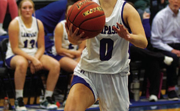 Addison Borchardt drives to the basket for a layup. HUNTER KING | DISPATCH RECORD